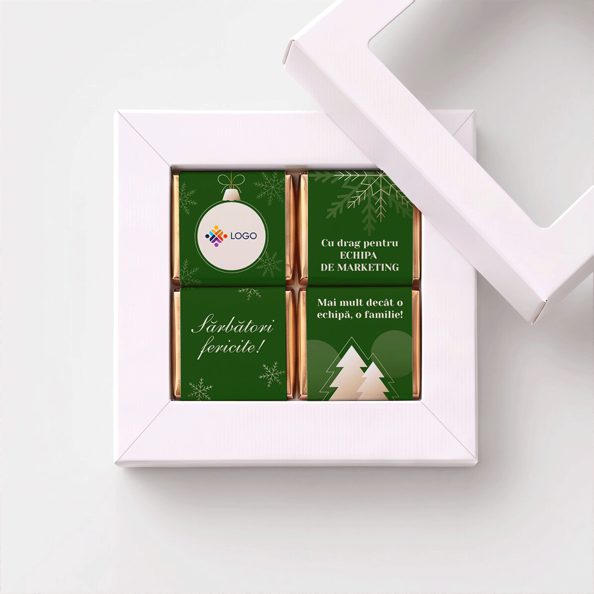 Gift box containing 4 mini chocolates, personalised with a logo and message for the team