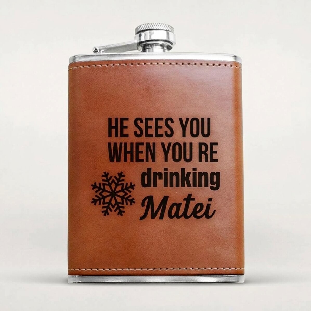 Personalised leather-covered hip flask - He sees you when you