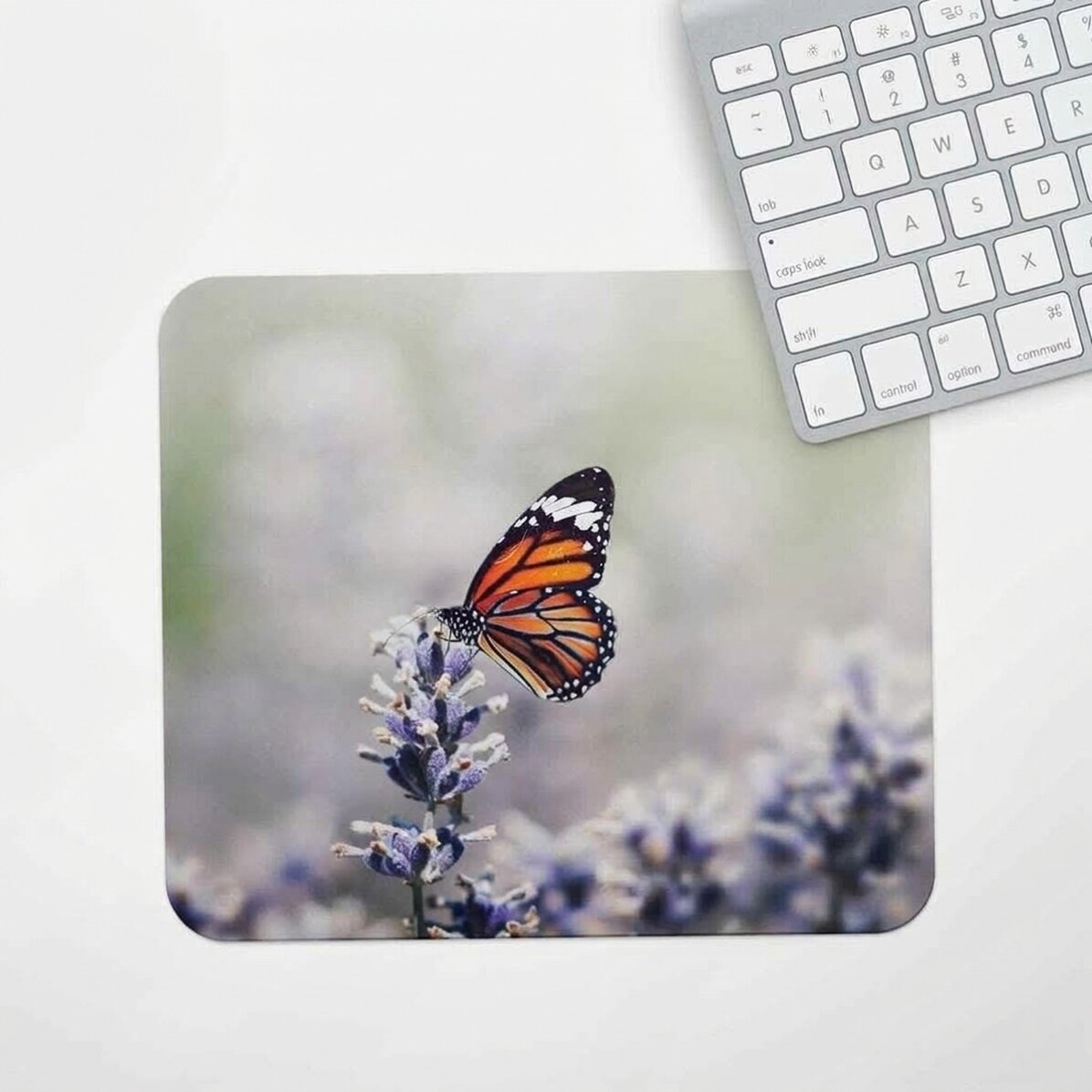 Personalised mouse pad with butterfly