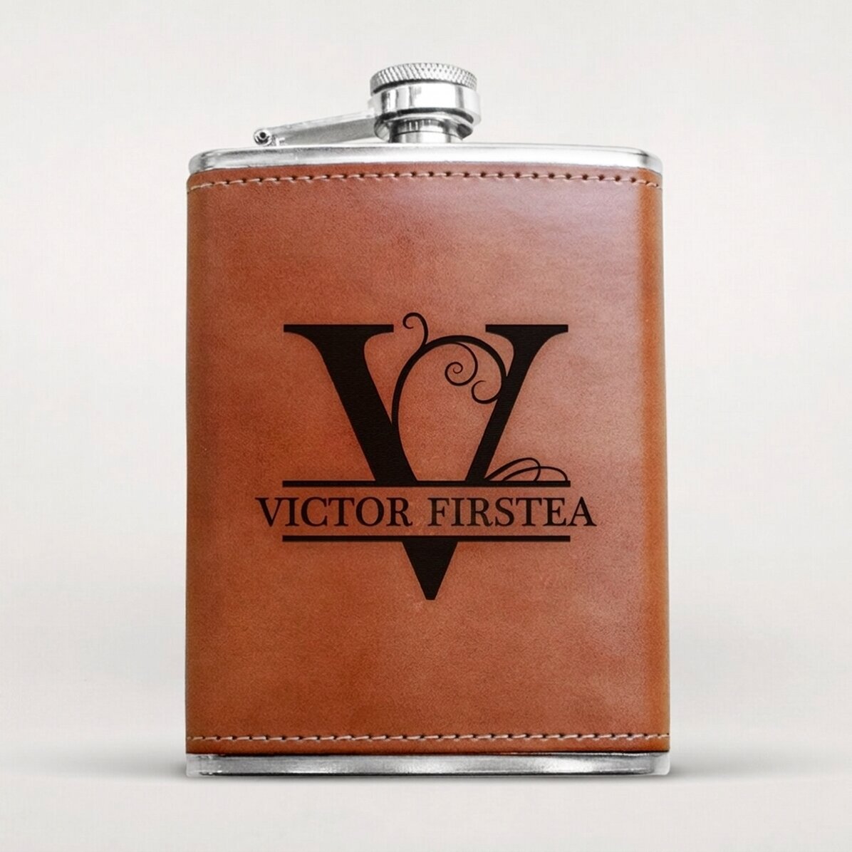Pocket flask covered in leather, personalised with monogram and name