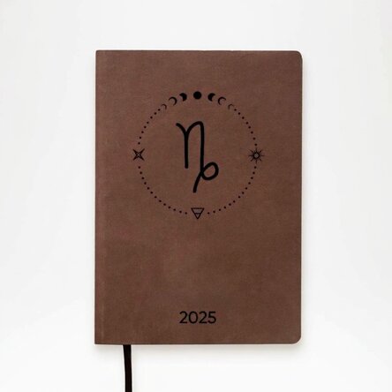 Personalised leather diary with text and Capricorn zodiac sign